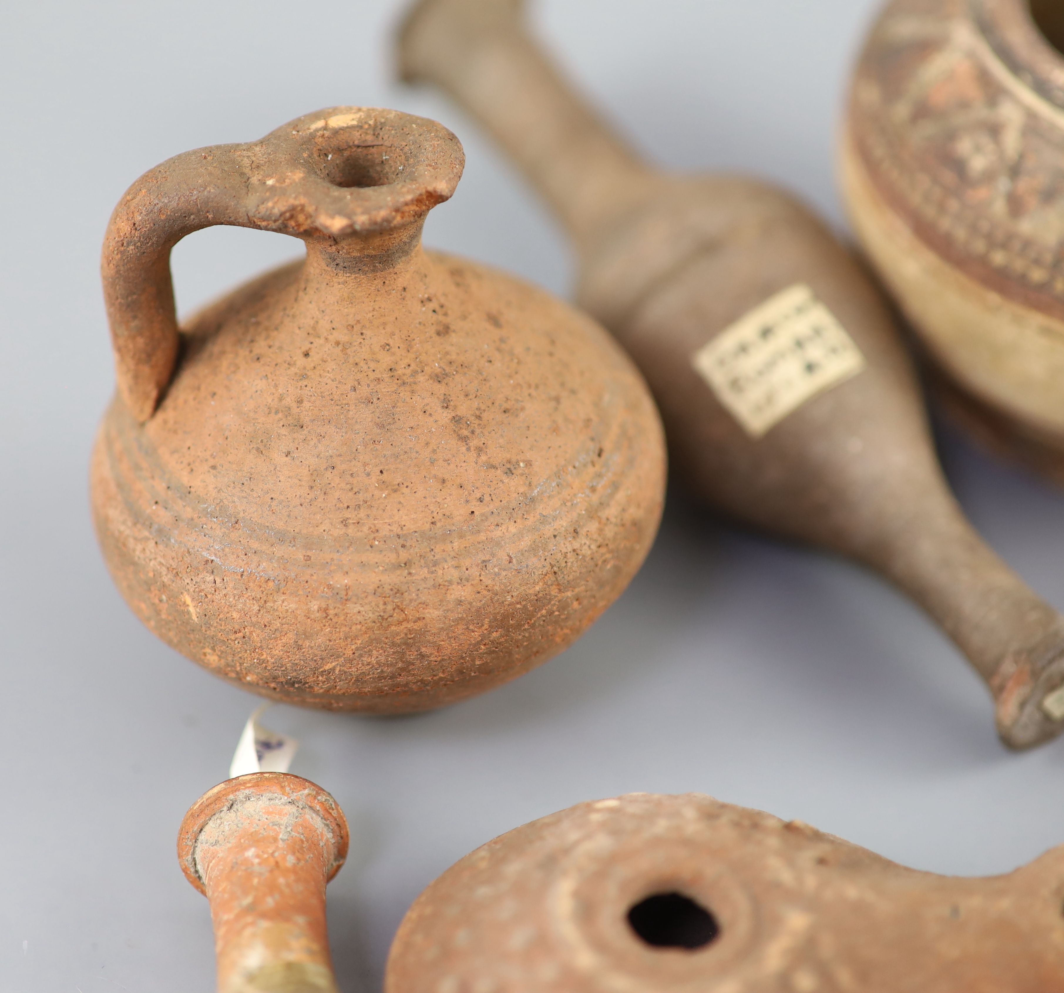 A group of Ancient Roman pottery vessels and a bronze statuette of Venus, mostly 1st-4th century AD, Provenance - A. T. Arber-Cooke